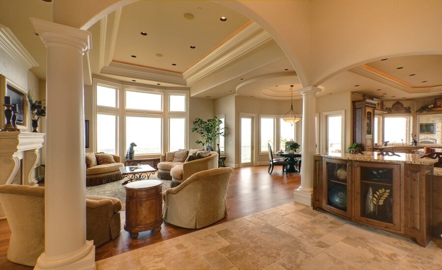 An open living space featuring in-ceiling, whole-house audio speakers.