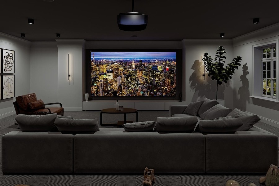 home theater space with large TV display and section sofa. Ambient lighting illuminates the room.